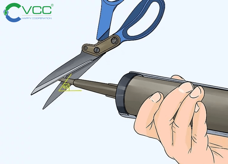 Cắt đàu vòi chai keo Epoxy VCC E102 trước khi lắp vào súng