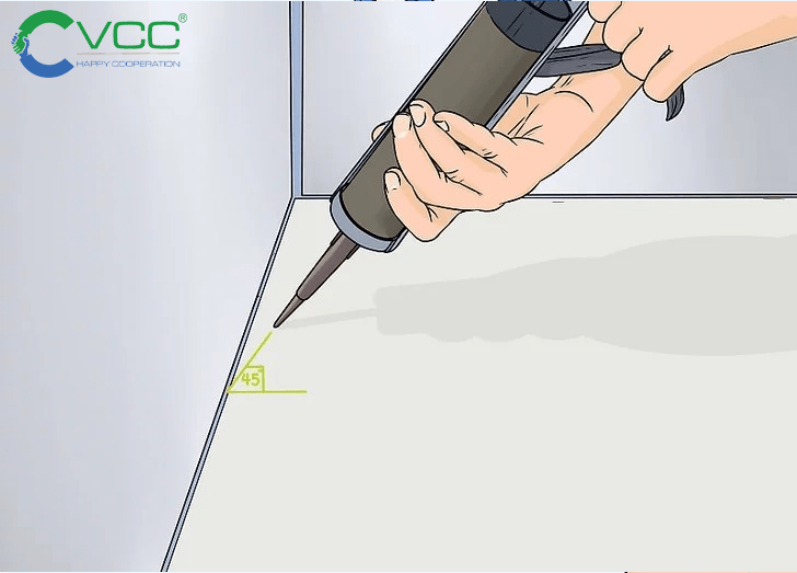 Giữ súng bắn keo góc 45 độ và bắn keo