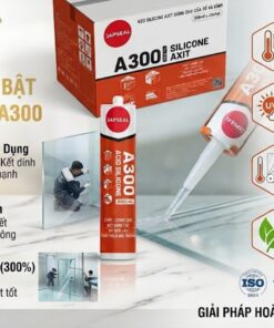 ): Infographic quảng cáo chuyên nghiệp cho keo silicone axit JAPSEAL A300 của VCC Sealant trên nền đá cẩm thạch. Hình ảnh hiển thị logo VCC, tiêu đề 'ĐẶC ĐIỂM NỔI BẬT CỦA JAPSEAL A300' và 'KEO TRONG SUỐT, TÍNH THẨM MỸ CAO'. Bối cảnh bao gồm các sản phẩm (thùng JAPSEAL, chai keo đứng, chai keo trong súng) và người thợ đang quỳ áp dụng keo lên vách kính. Hai hình ảnh nhỏ minh họa thi công bể cá và vách kính được giữ lại. Các cột liệt kê 7 đặc điểm chính với icon và văn bản chi tiết: Gốc Axit Chuyên Dụng (Bể cá & Kính), Đóng Rắn Nhanh, Độ Đàn Hồi Cao (300%), Chịu Nhiệt Độ Cao, Kháng Thời Tiết & Tia UV, Thẩm Mỹ Đa Dạng (Trong suốt, Trắng, Đen), An Toàn & Thân Thiện. Các chứng nhận ISO, EN, và A+ được hiển thị rõ ràng. Bề mặt sàn đá cẩm thạch phía trước bên trái của chai keo đứng liền mạch và sạch sẽ.