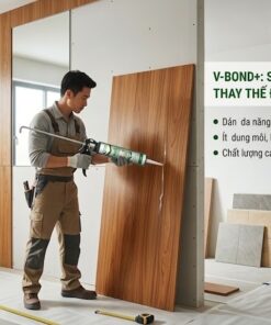 Người thợ đang dùng súng bắn keo VCC V-Bond+ dán tấm gỗ nội thất tại công trình, minh họa giải pháp thay thế đinh vít.