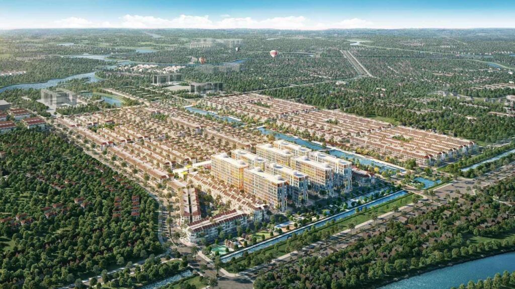 Aerial View of a Planned Urban Neighborhood with a Large Cluster of Modern Apartment Blocks Rows of Townhouses Canals and Surrounding Green Landscape  Vcc Sealant   Sản Xuất Phân Phối Keo Silicone Và Chất Kết Dính Chuyên Nghiệp